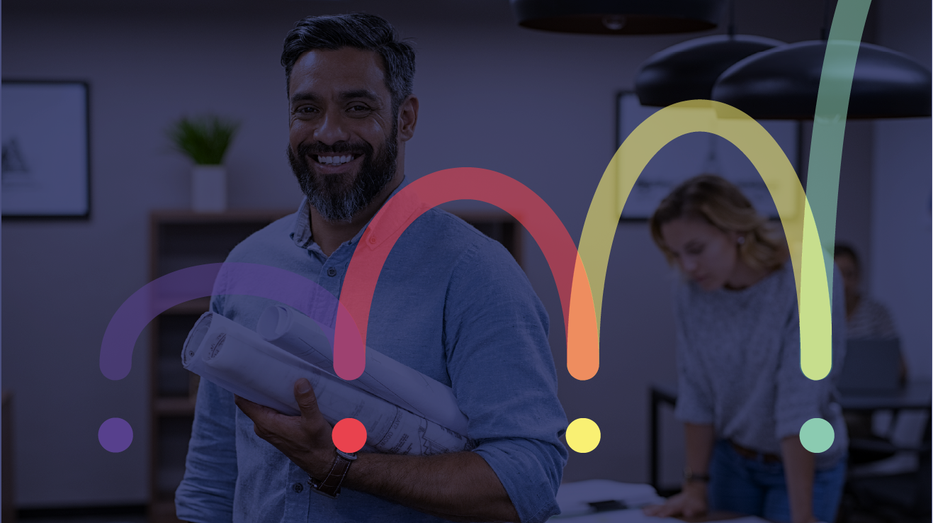 Smiling bearded man in blue shirt holding tablet in modern office setting with colorful arc graphics overlay